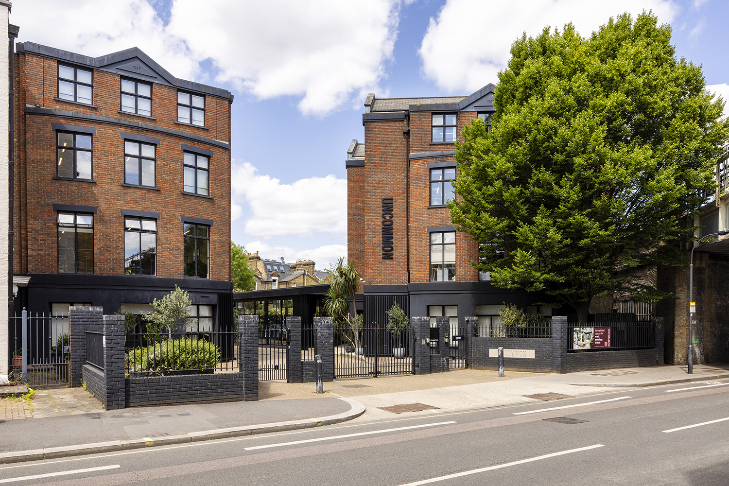 Flexible office buildings in London courtyard photographed by London architectural photographer with natural sky