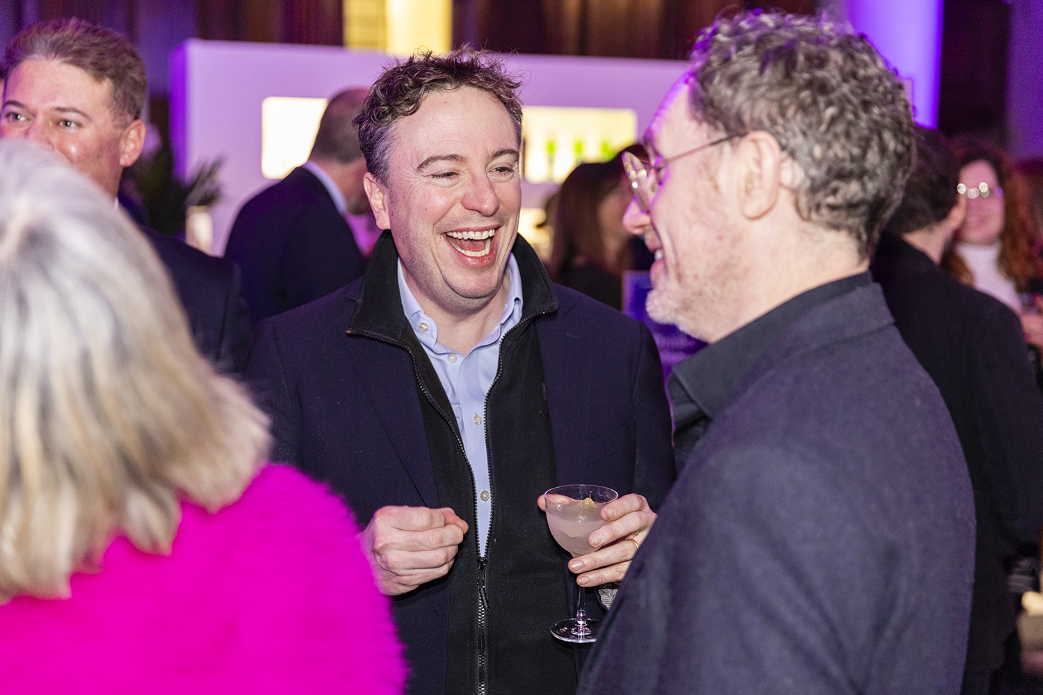 Guests networking during arrivals and drinks reception at London awards event