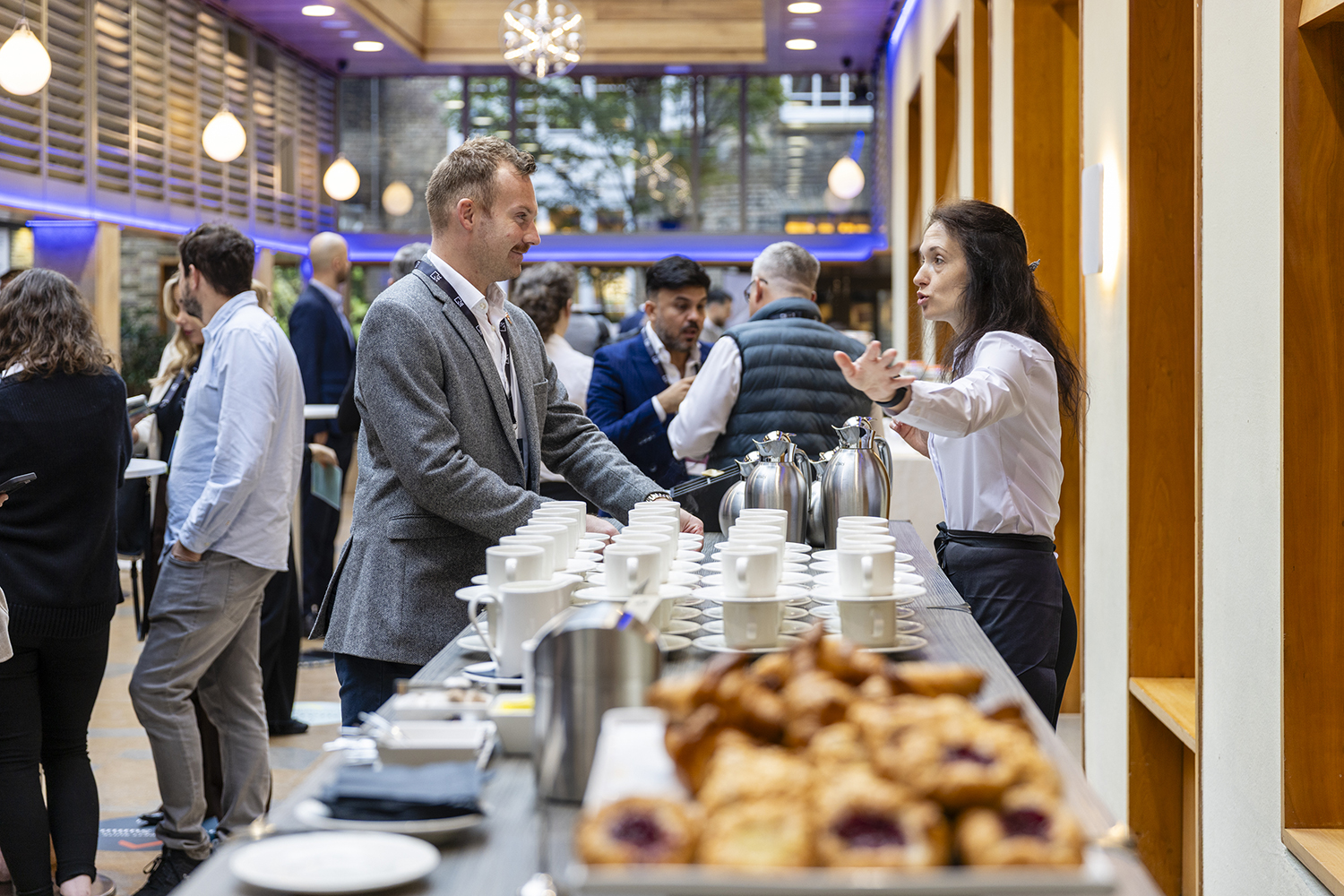 Coffee break networking at corporate conference event in central London