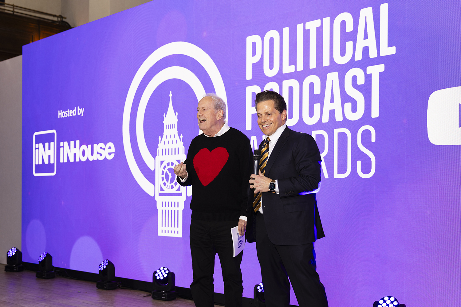 Anthony Scaramucci and Gyles Brandreth, Hosts presenting on stage during London political podcast awards event