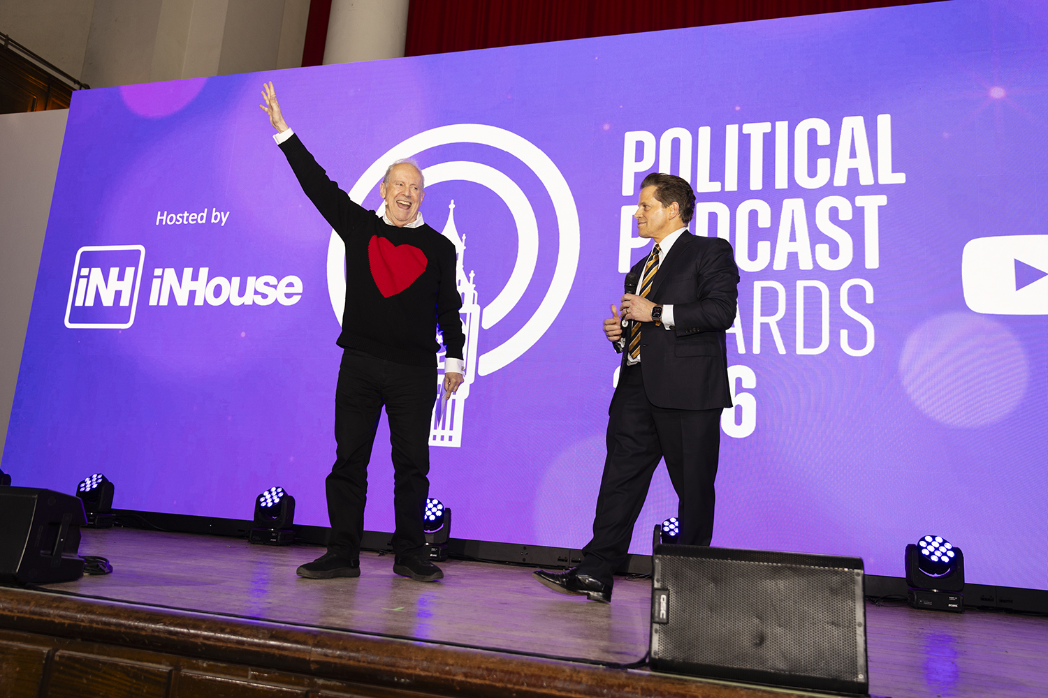Anthony Scaramucci and Gyles Brandreth, Hosts presenting on stage during London political podcast awards event
