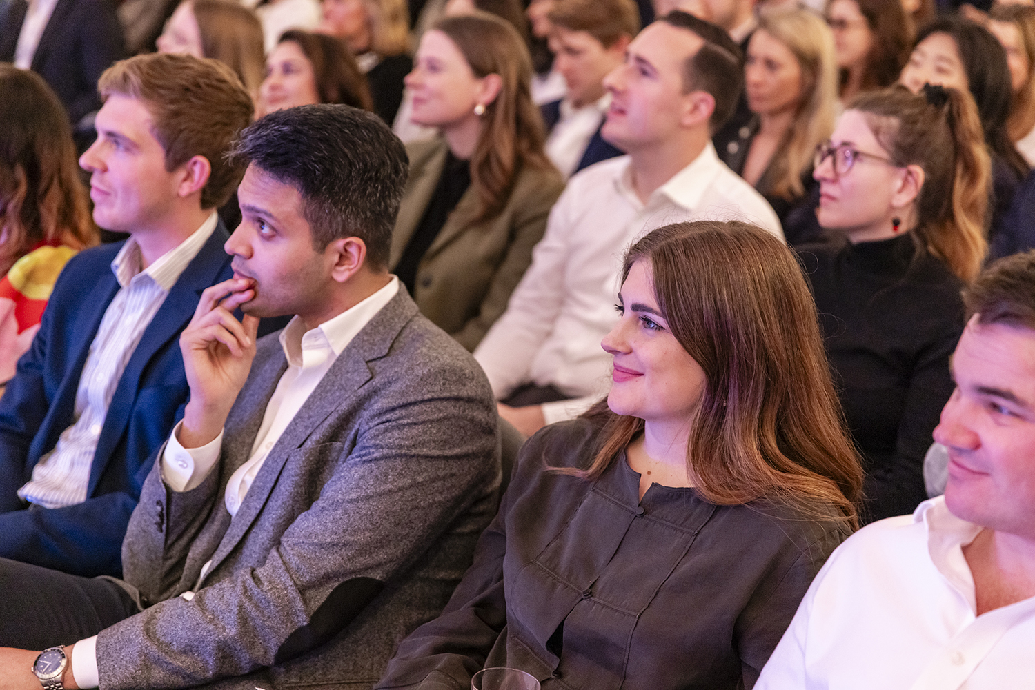 Audience listening attentively during corporate presentation at Claridge’s London
