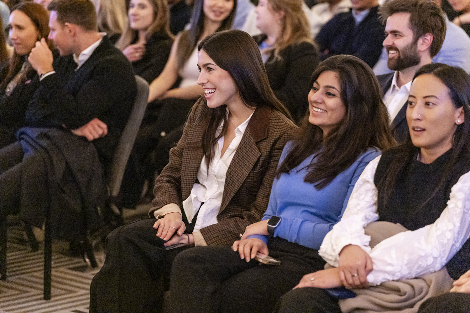 Side view of engaged audience during business presentation at Claridge’s London